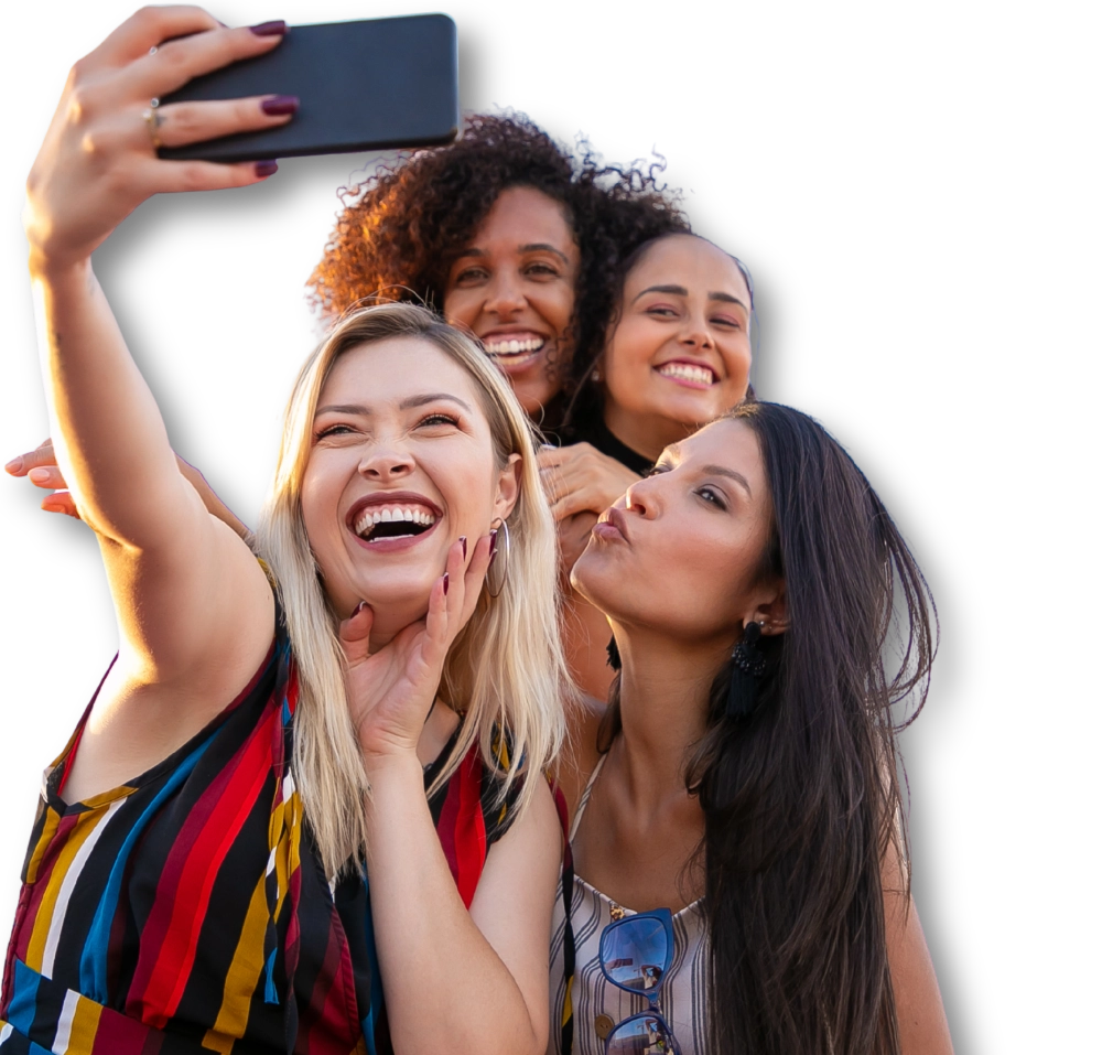 Cheerful multiethnic girlfriends taking selfie